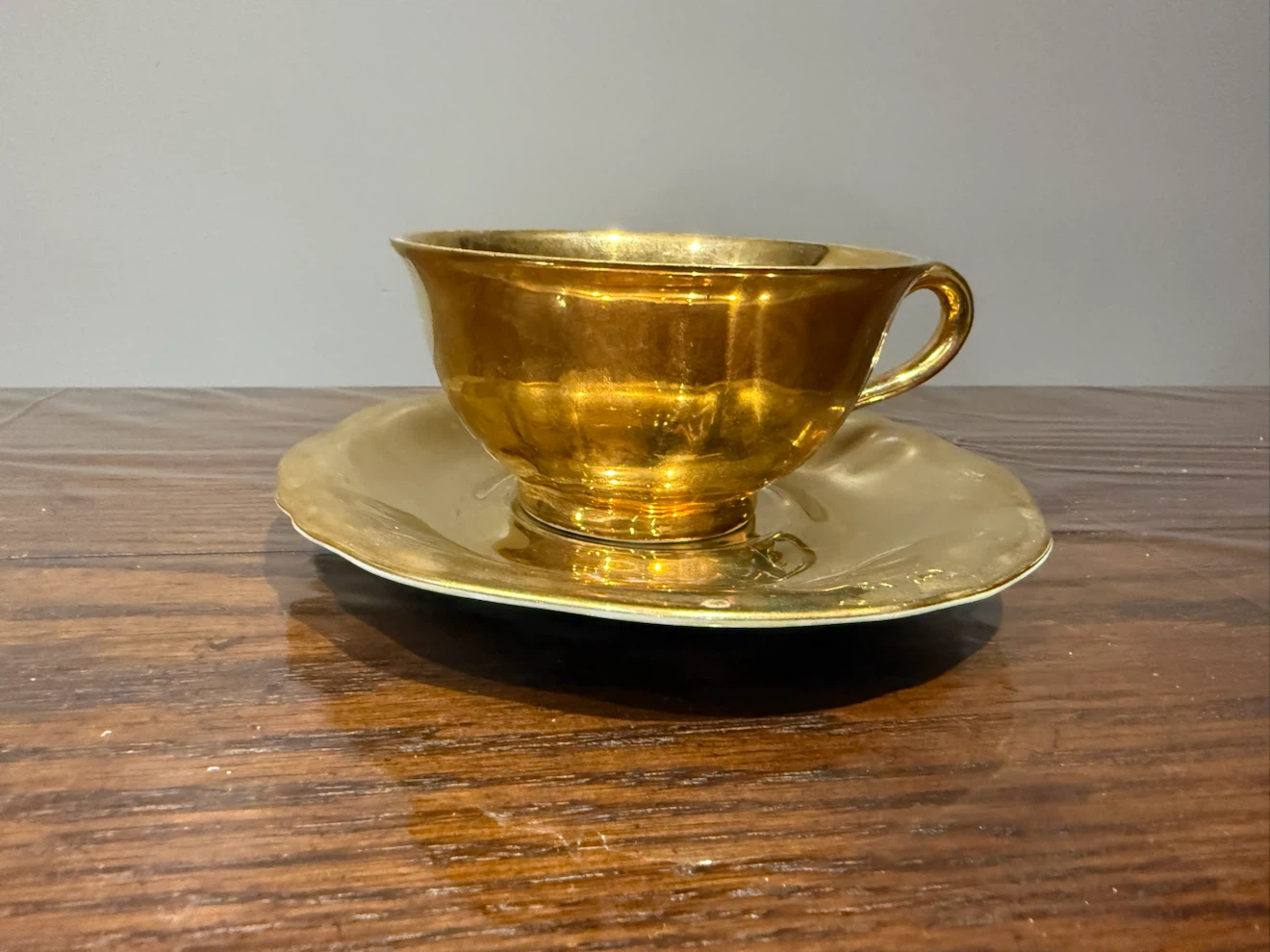 Gold Coloured Teacup and Saucer