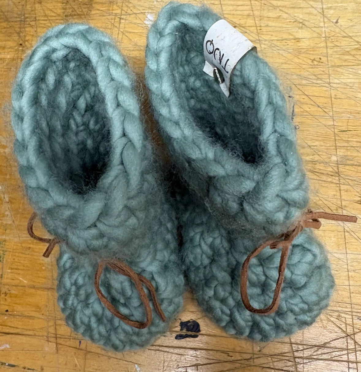 Hand-knitted baby booties