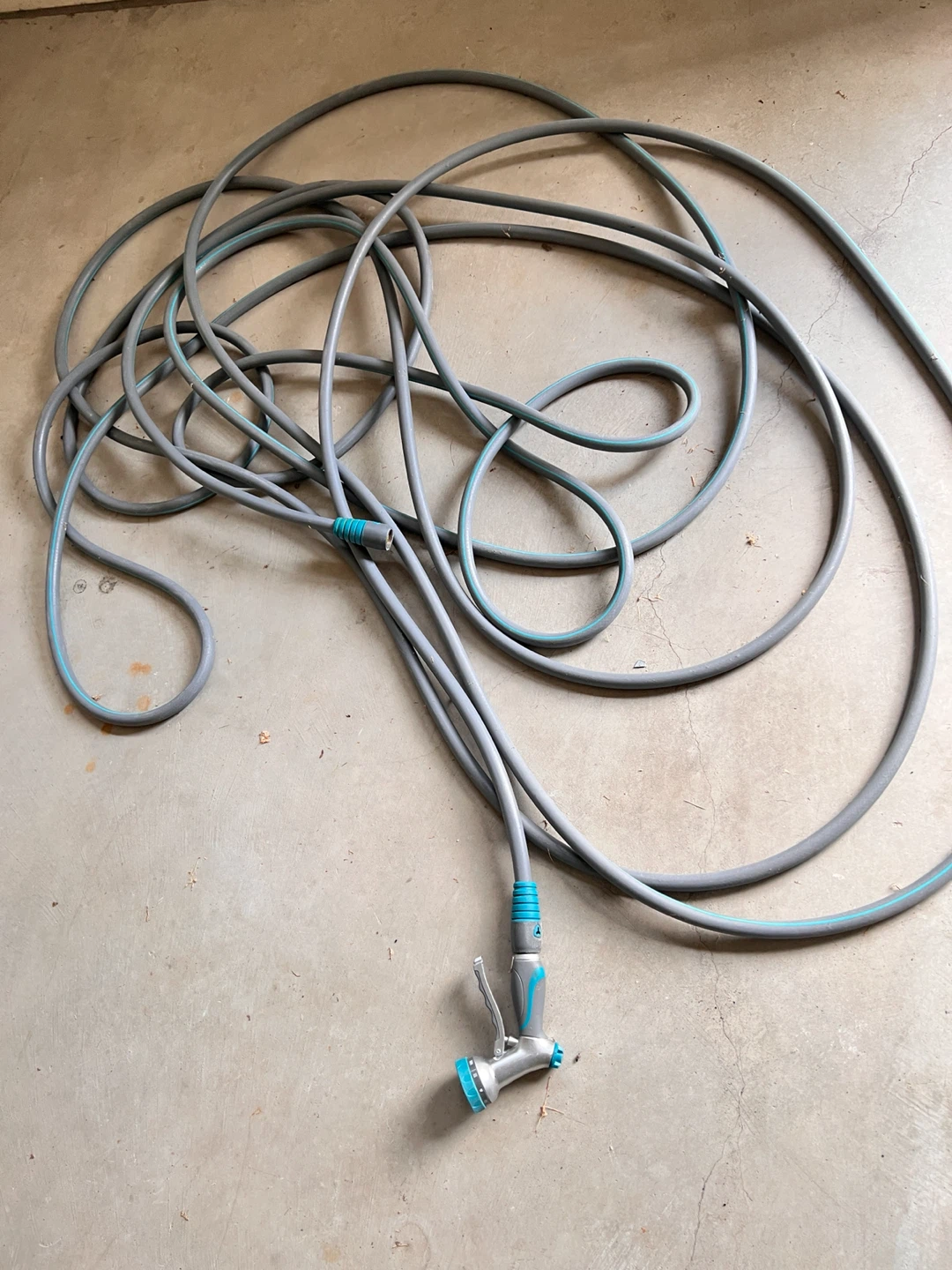 Grey Garden Hose with Spray Nozzle