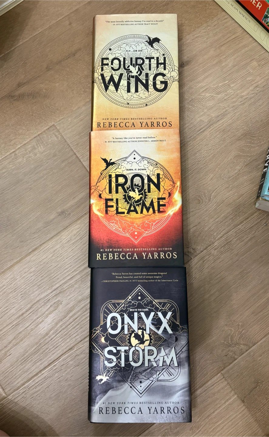Fourth Wing, Iron Flame and Onyx Storm by Rebecca Yarros
