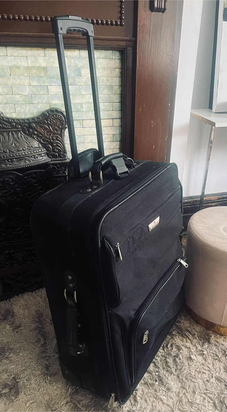 Large Black Rolling Suitcase like New