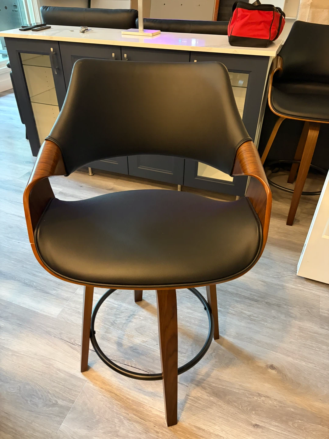 Ivy Bronx Lyllian Swivel Upholstered Counter Stool