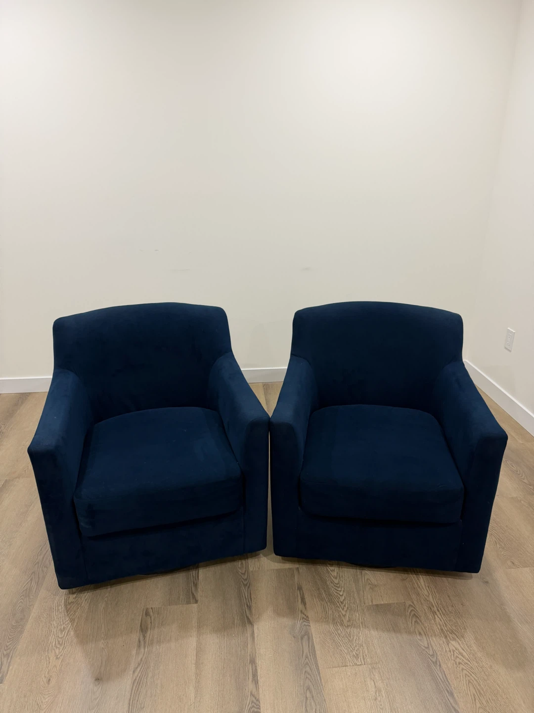 2x Blue Swivel Accent Chairs