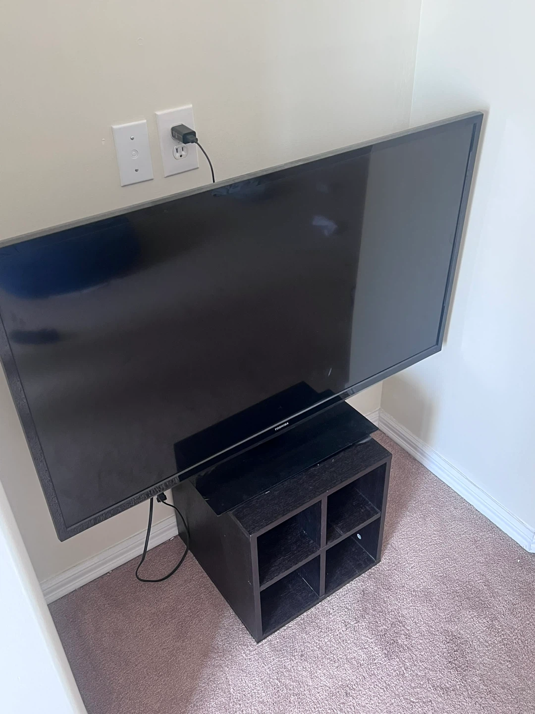 Toshiba Flat Screen TV with a small stand