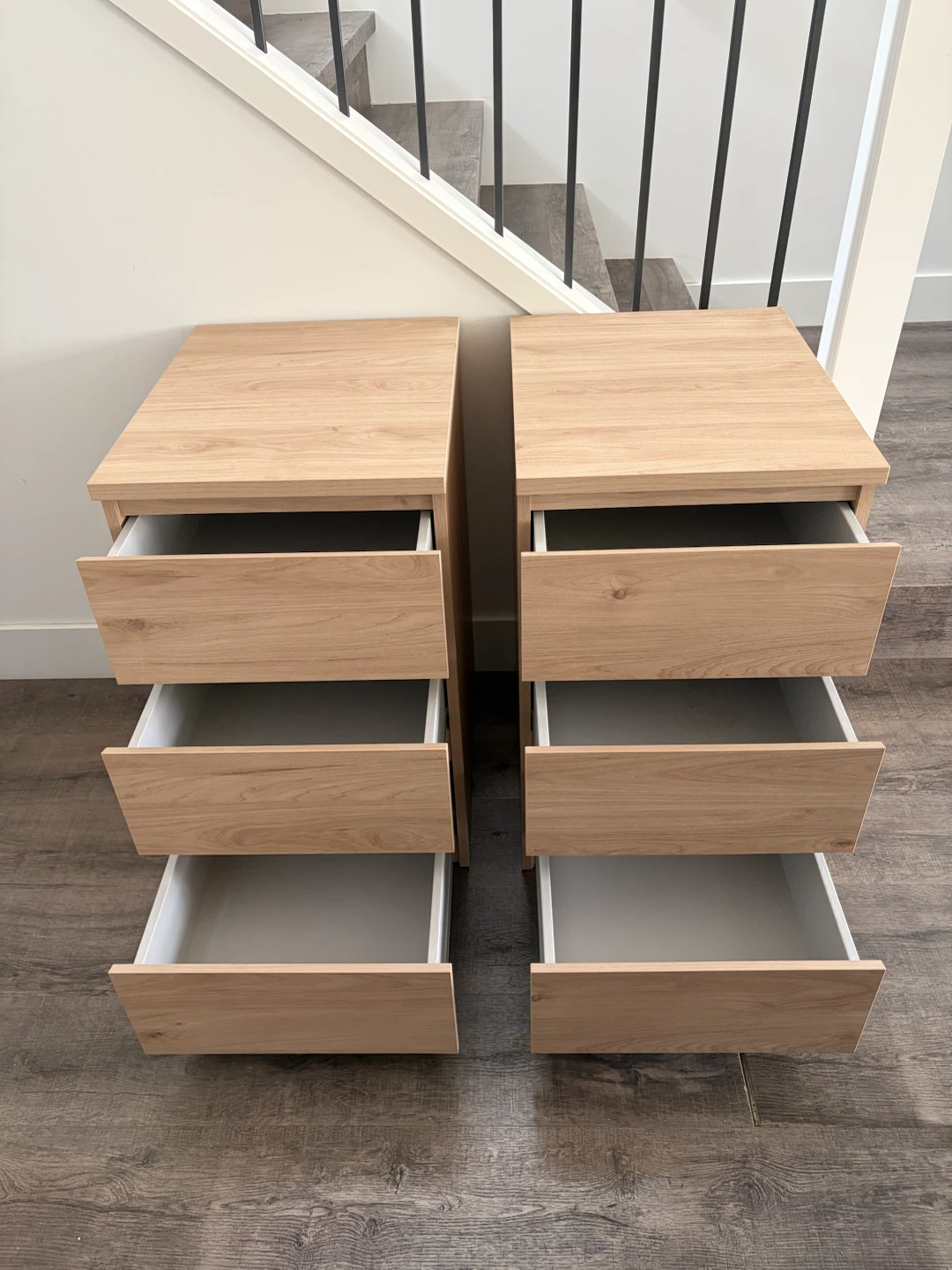 pair of nightstands with 3 drawers