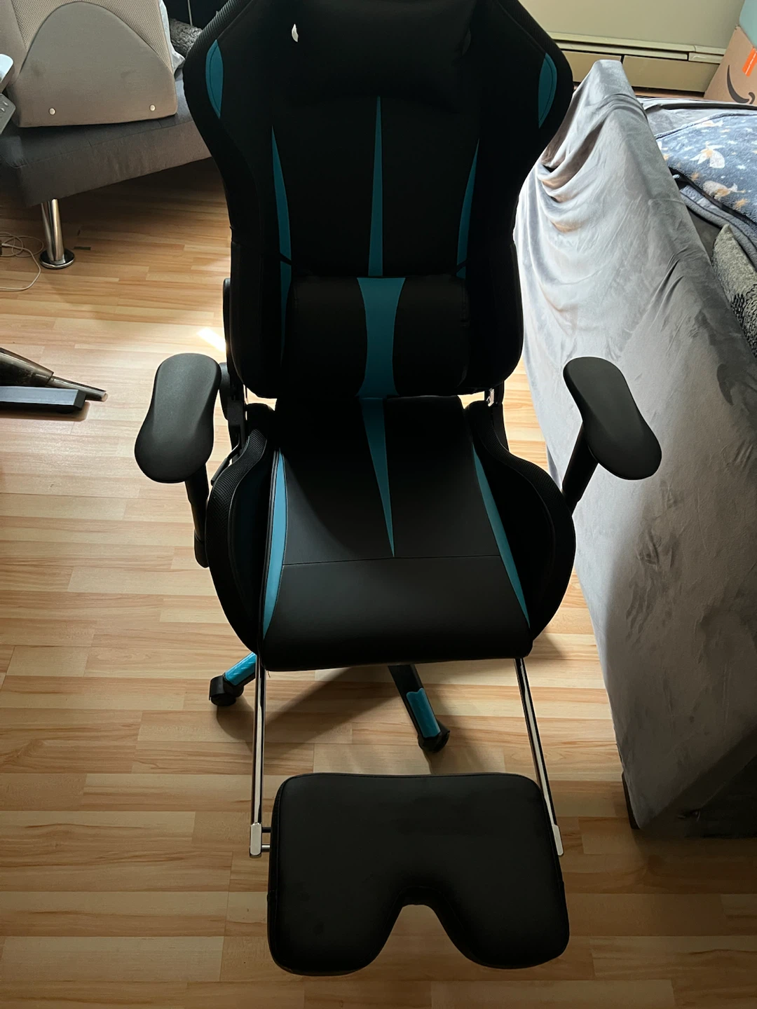 Black and Teal Gaming Chair with Footrest