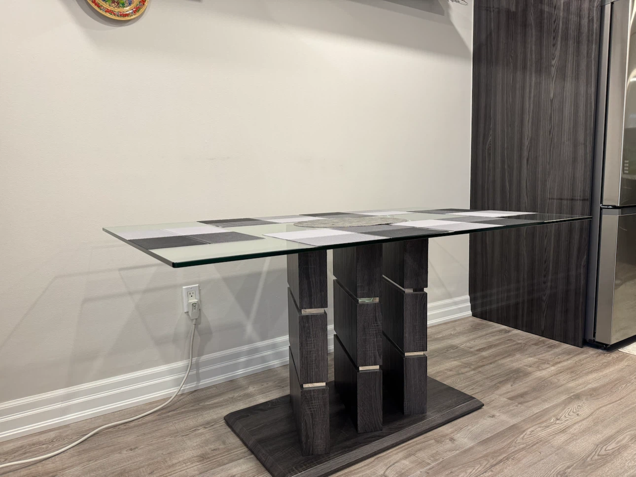 Dining table with a clear glass top and a solid wooden base - photo 5