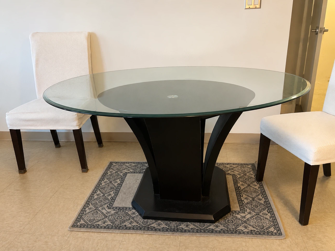 Round Glass Top Dining Table with Black Pedestal Base