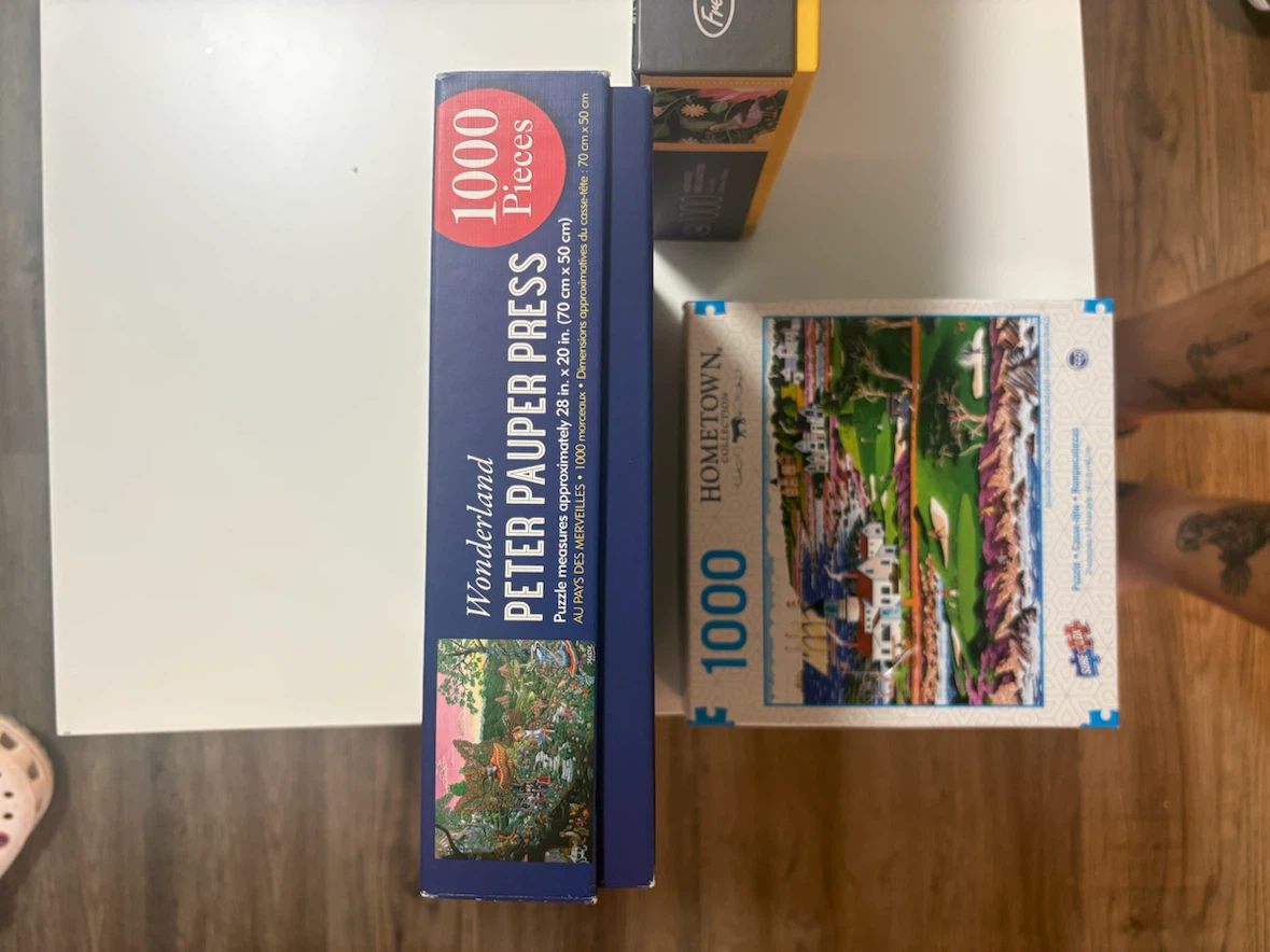 Three 1000 piece puzzles - photo 5