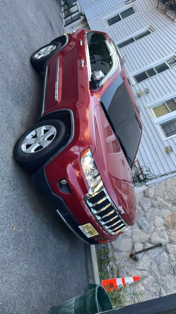 Red Jeep Grand Cherokee SUV