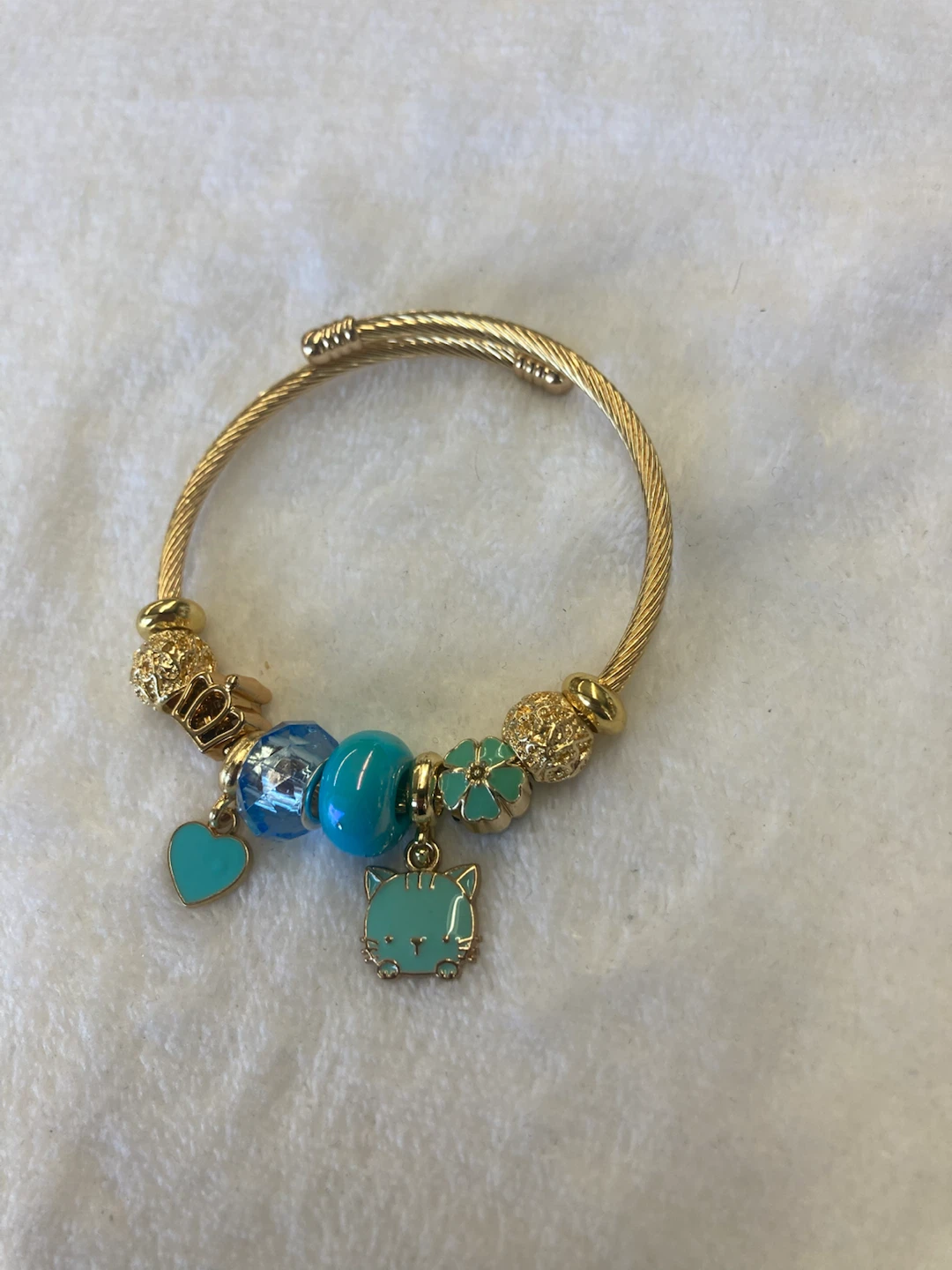 Gold Tone Charm Bracelet with Blue & Teal Accents