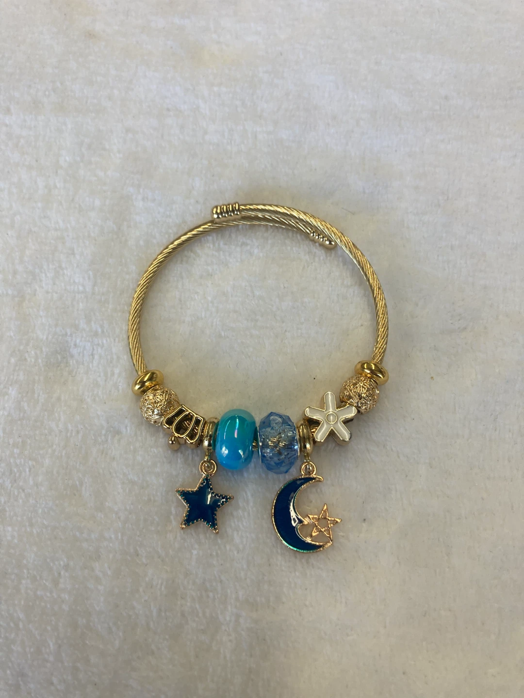 Gold Tone Moon and Star Charm Bracelet