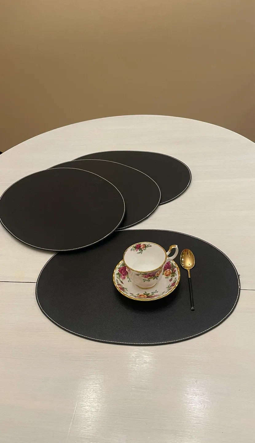 4 Black Oval Placemats