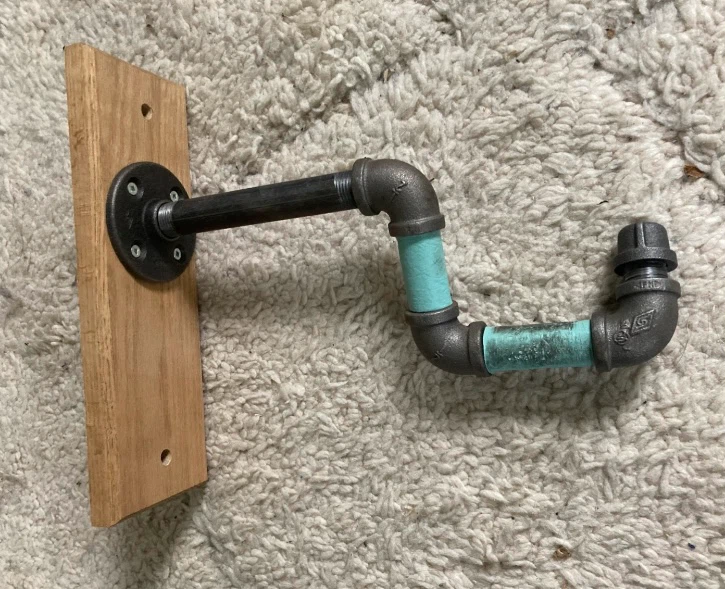 Industrial pipe and wood wall bike mount
