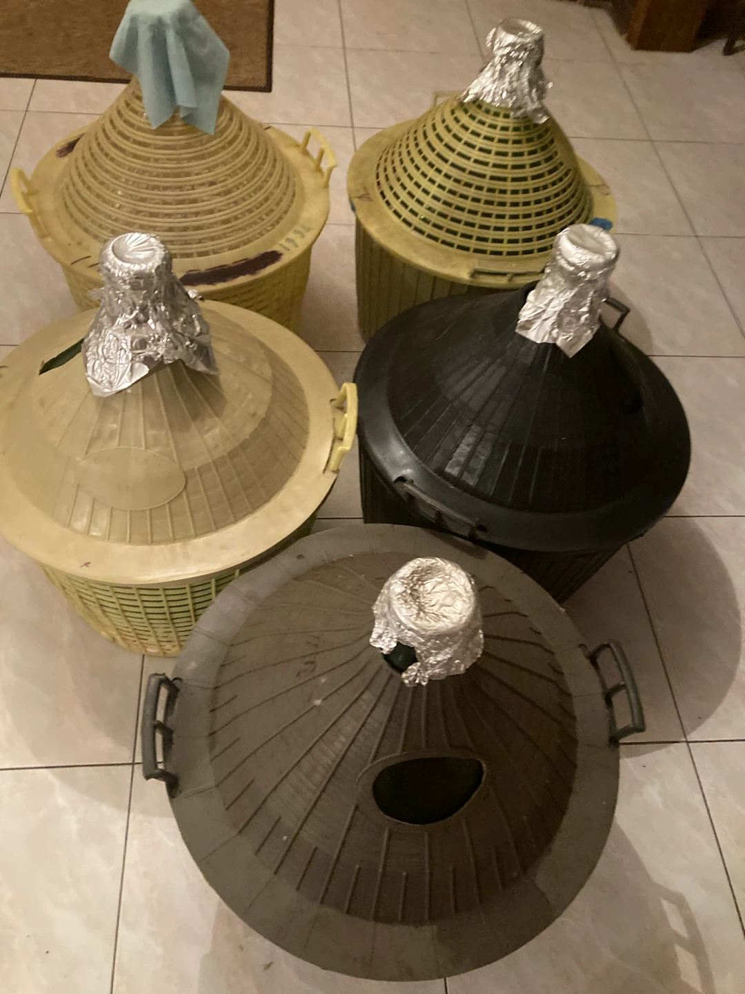 Set of 9 Glass Demijohns/Carboys with Baskets
