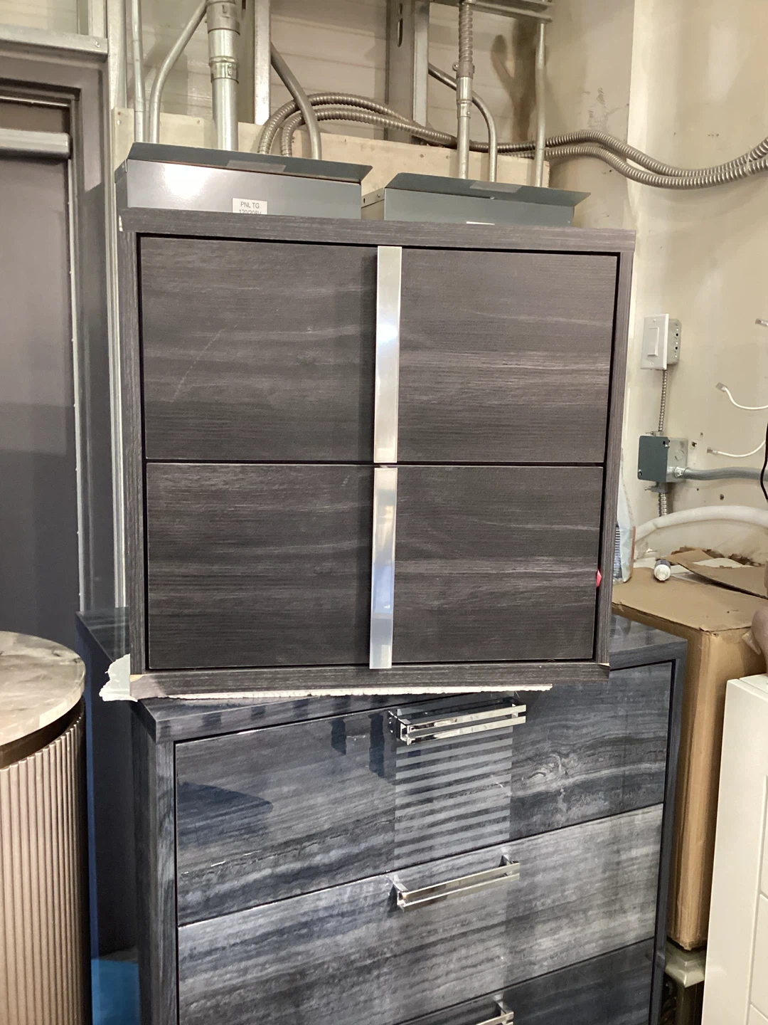 Dark Wood Dresser with Silver Accents