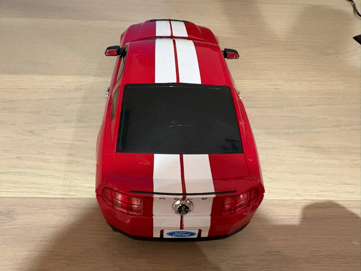 Red toy car with white stripes - photo 3