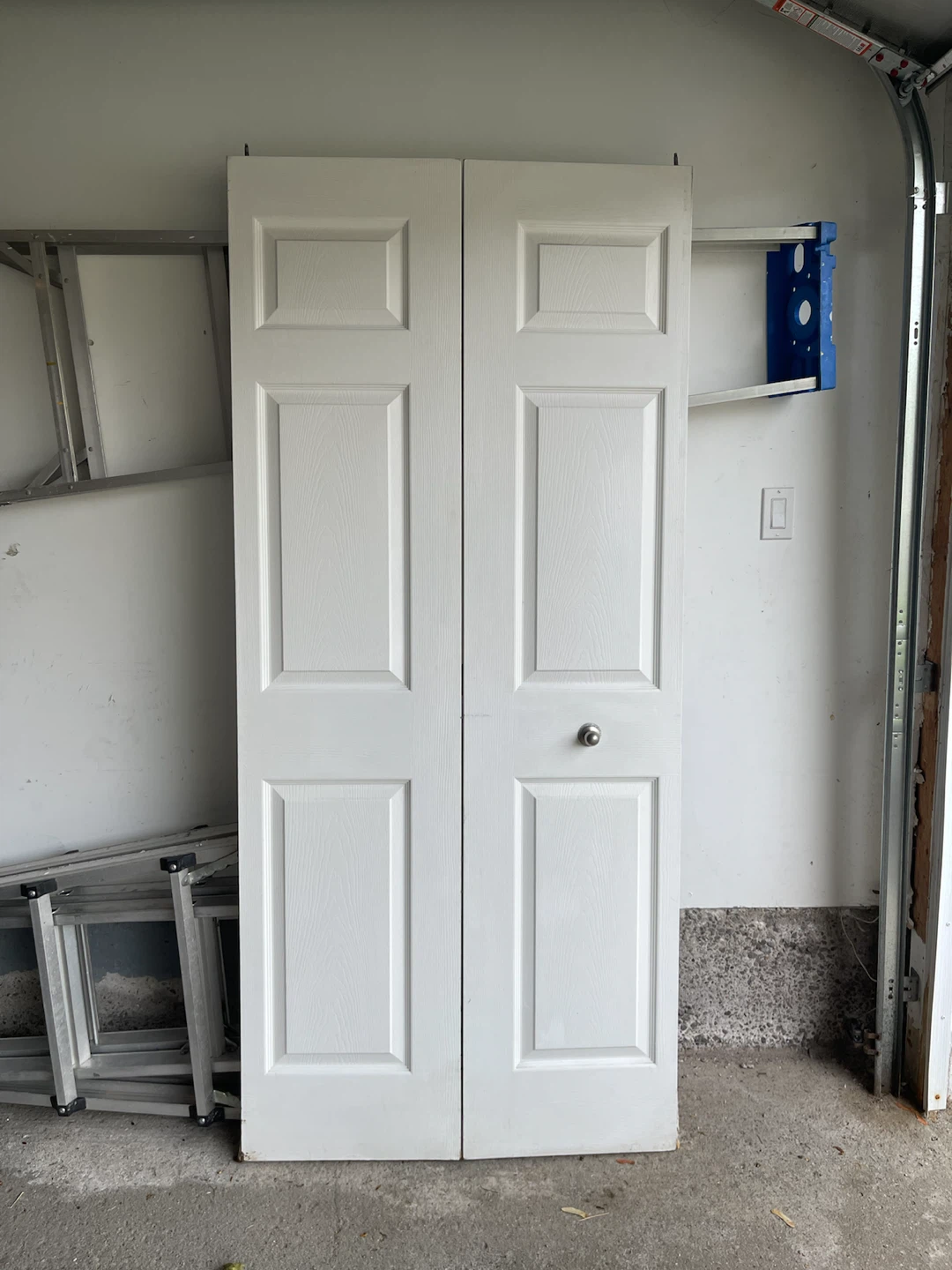 White Bi-fold closet doors