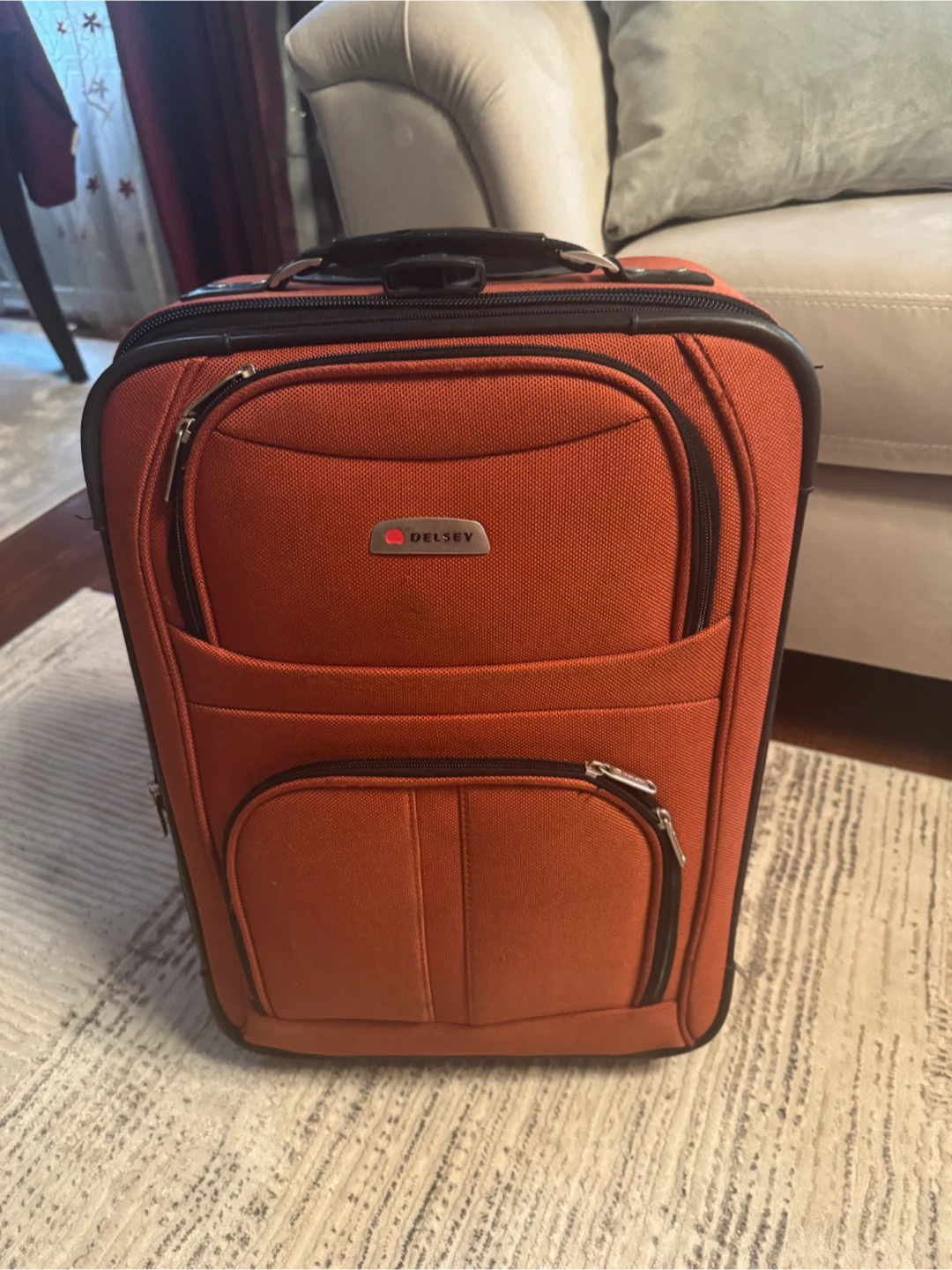 Delsey Orange Carry-On Luggage