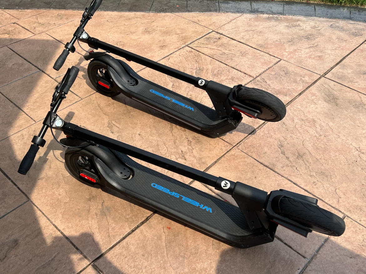 Two Black Wheeled Scooters