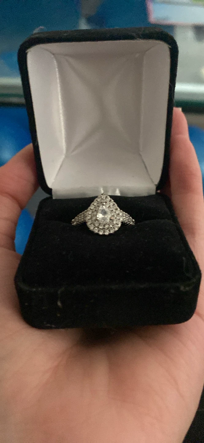 $150-$110/ Disney Ariel ring/ pear cut/ 0.95 CT. T.W.