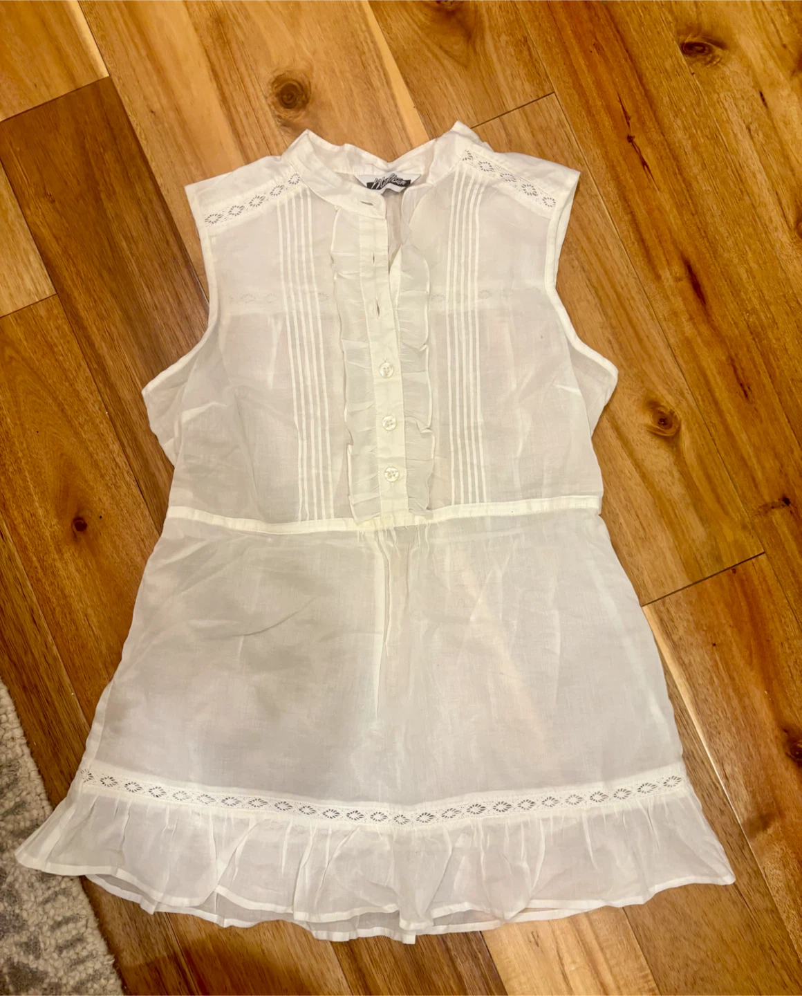 White Sleeveless Ruffle Blouse