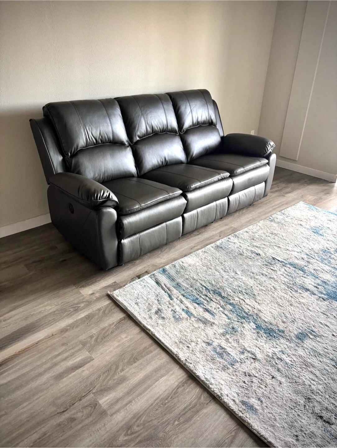 LEATHER-LIKE POWER RECLINING SOFA DARK GREY — $850