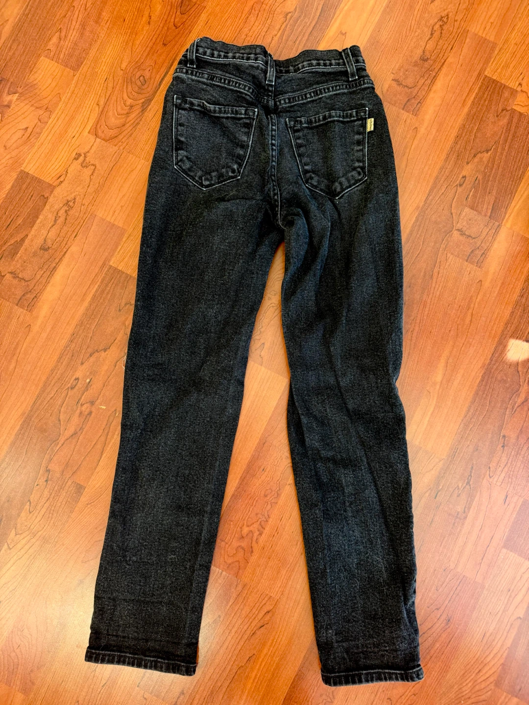 Black Distressed Knee-Rip Jeans | Size 24 - photo 2