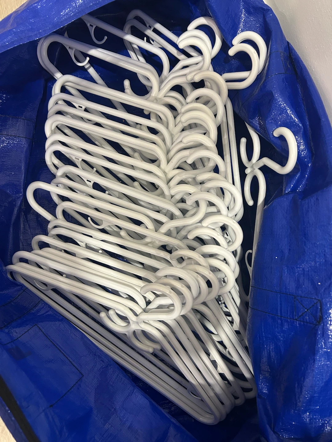 White Plastic Clothes Hangers - Lot of 28