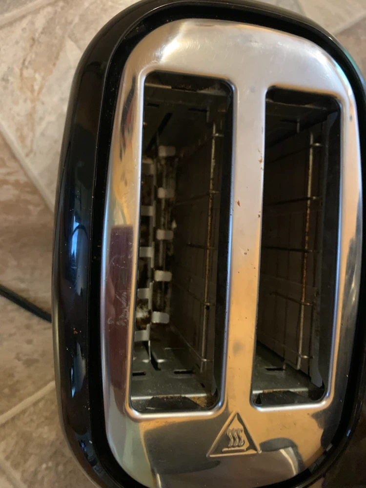 Used the toaster.   Wiped it clean.  Works very well