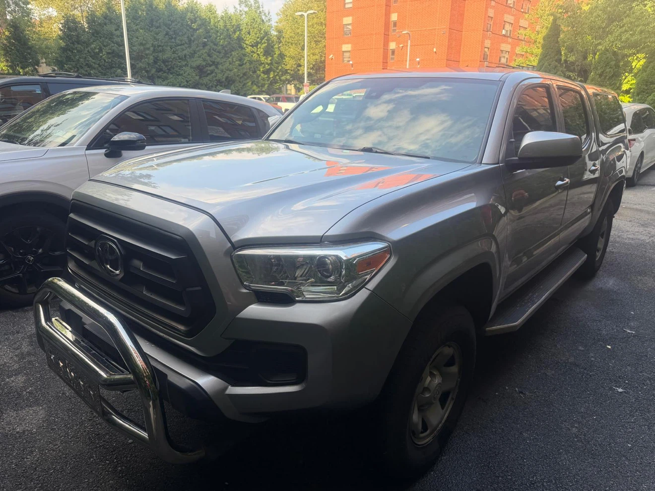 Silver Toyota Tacoma Truck with Cap