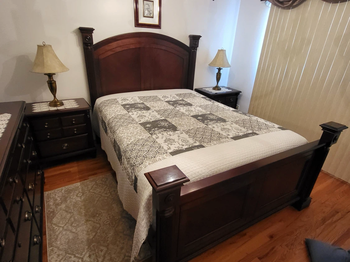 Dark Wood Bedroom Set with Dresser, Mirror, and Bed Frame