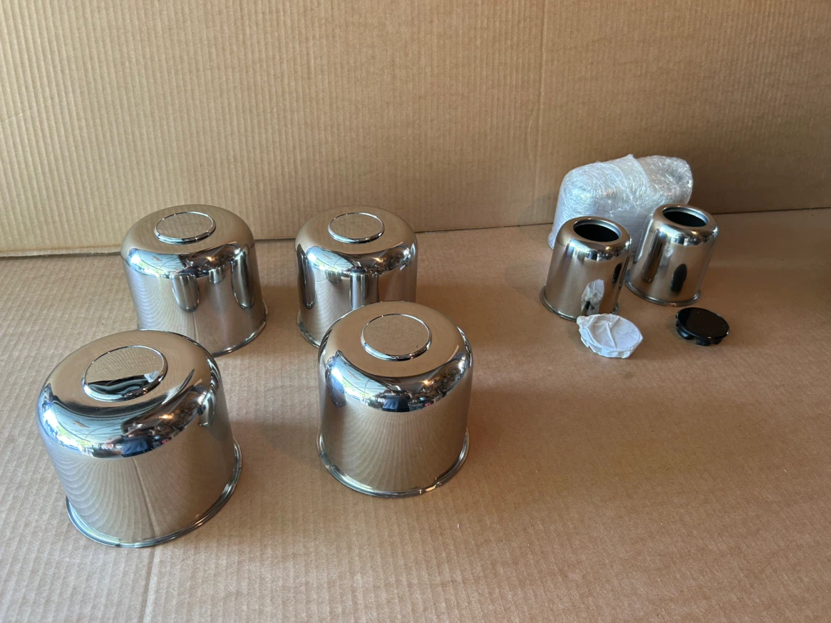 2 Sets of 4 Chrome wheel hub caps
