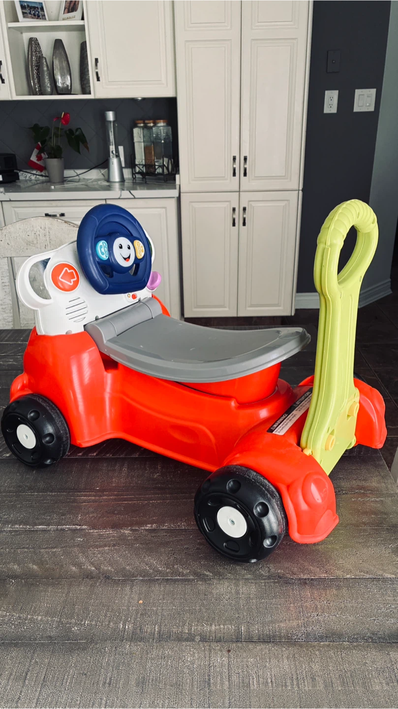 Fisher Price toddler ride on with lights & sounds