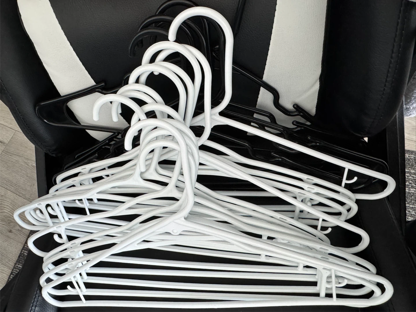 Set of 12 White and 6 Black Plastic Hangers