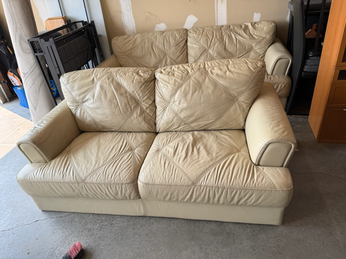 Pair of beige leather sofas