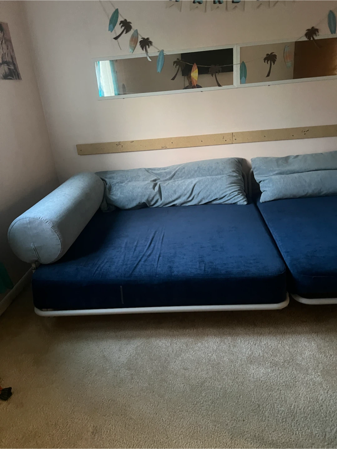Blue Futon Couch with Bolster Pillow