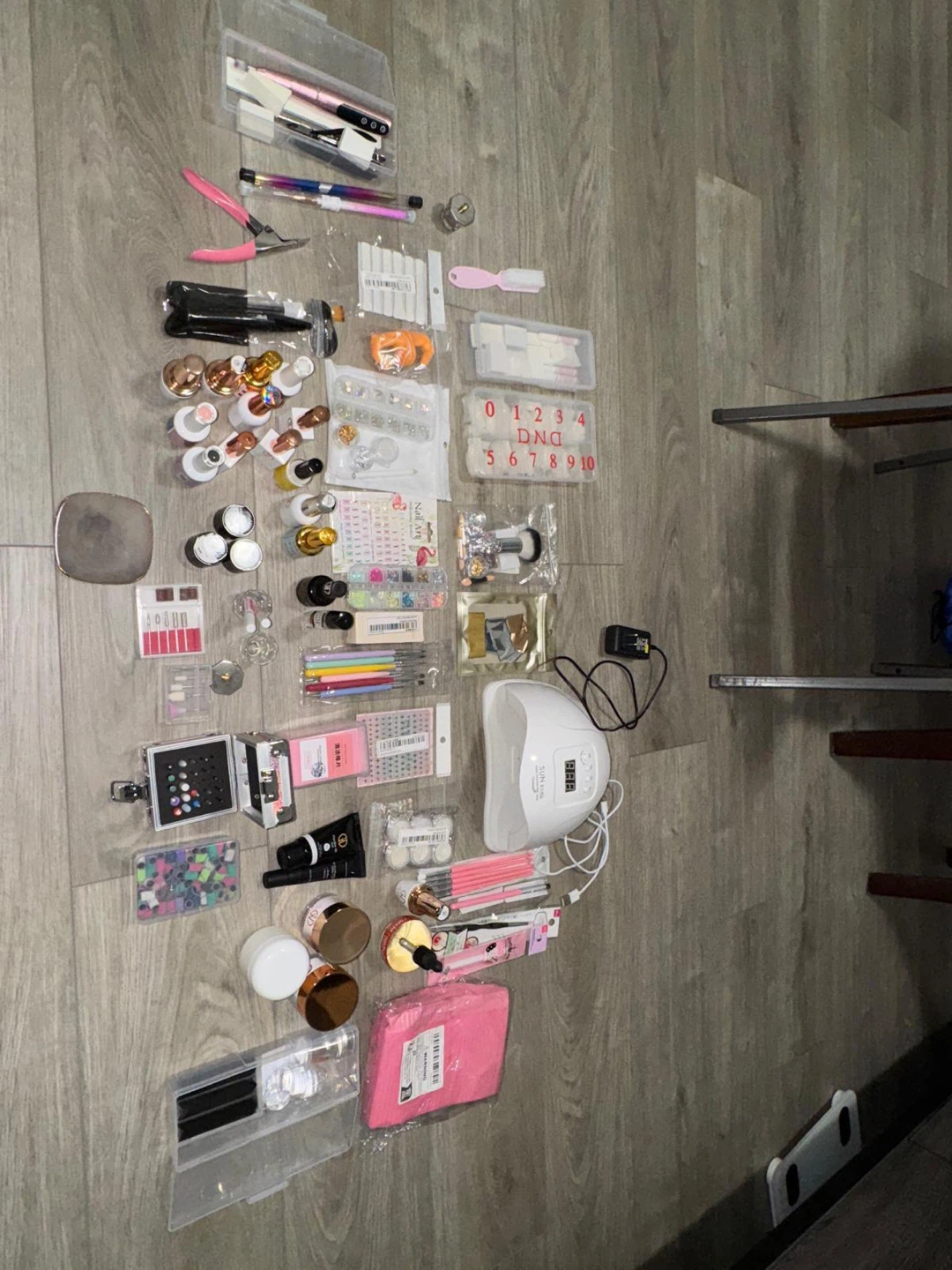 Assorted Nail Art Supplies with UV Lamp