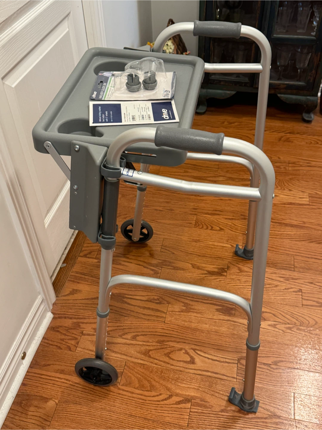 Folding walker with tray & 5” wheels - like new condition