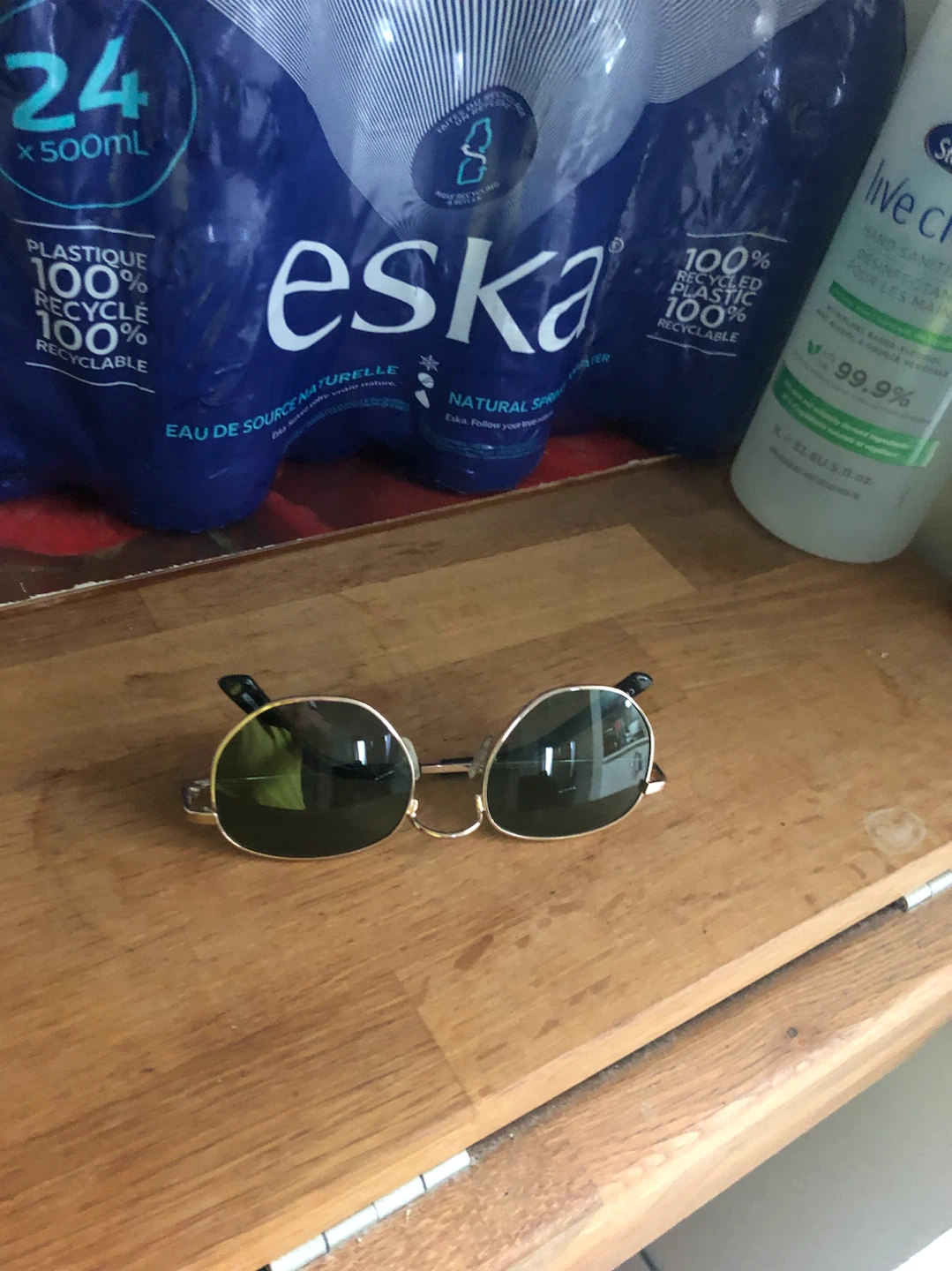 Gold frame round sunglasses