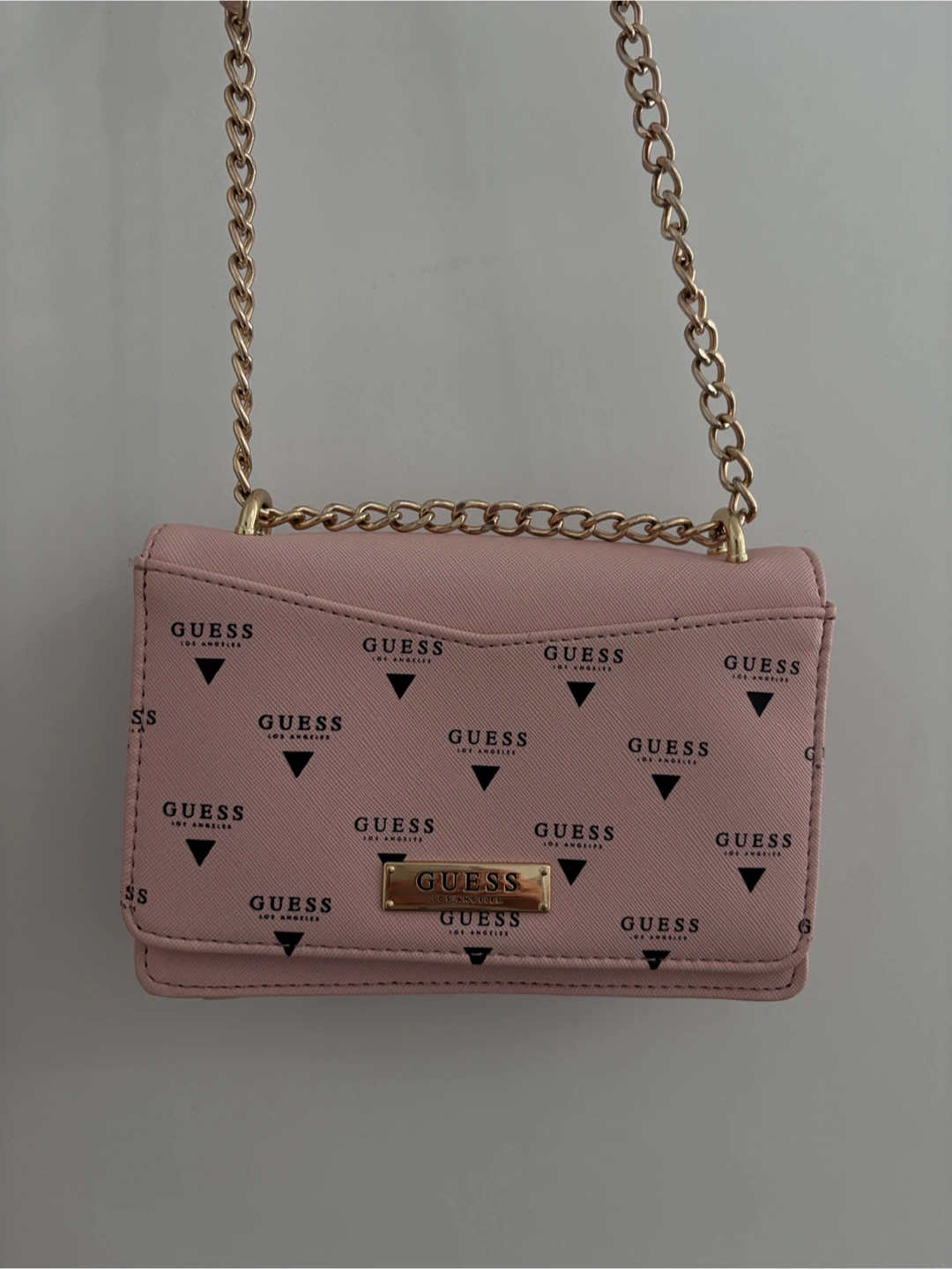 Pink Guess crossbody bag