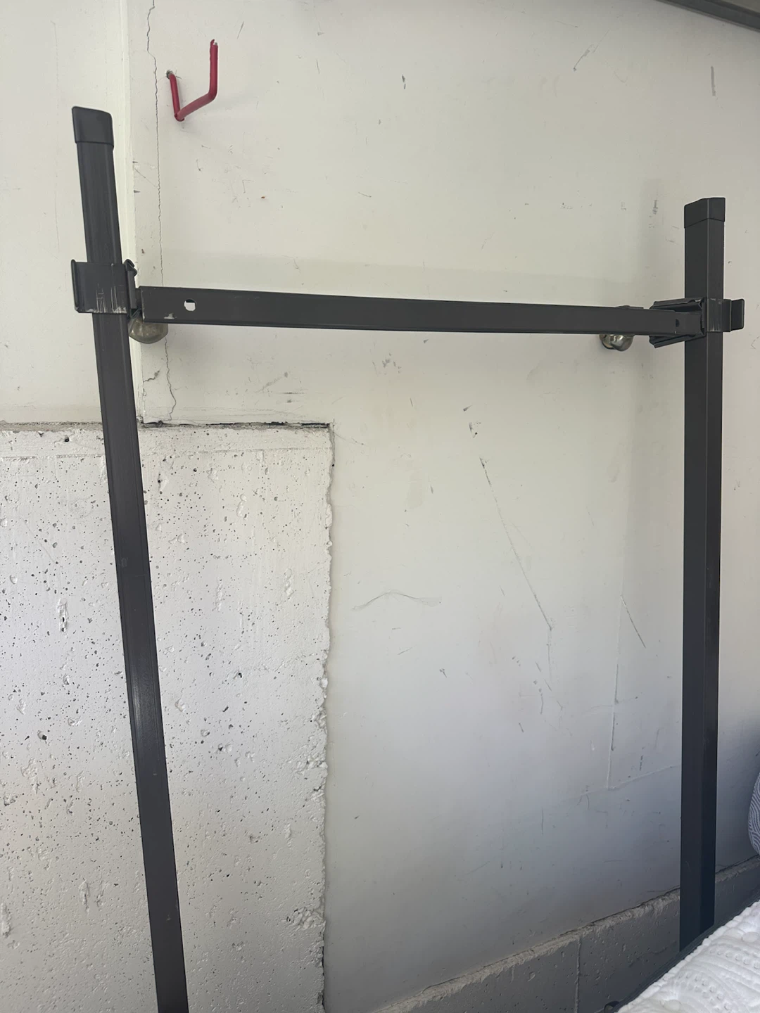 Single metal bed frame with castor wheels. Port Moody