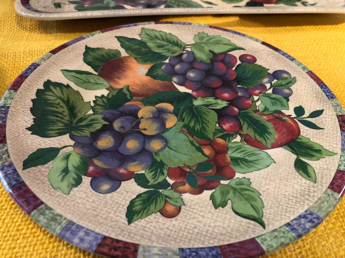 NEW set of four plates