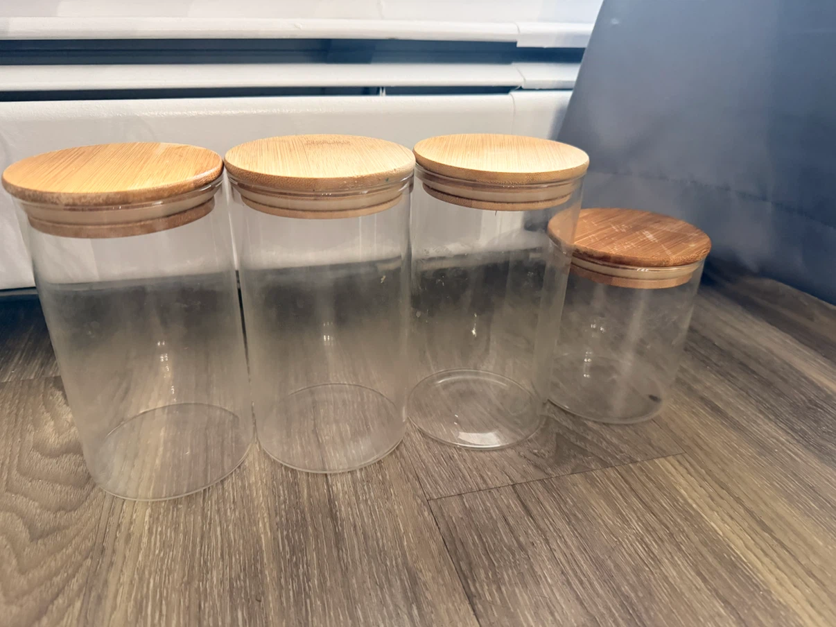 4 Glass Jars with Bamboo Lids and complimentary jars