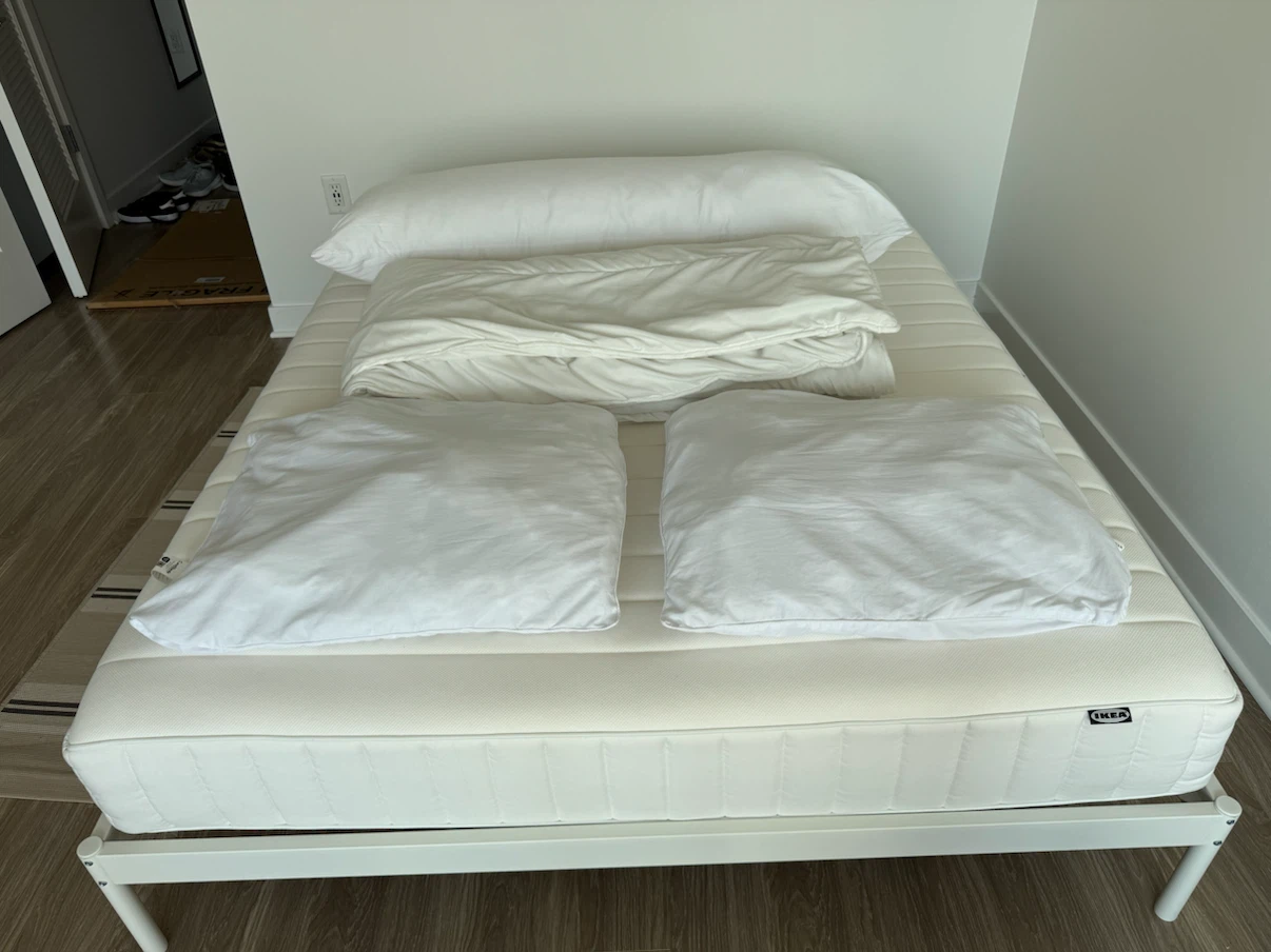 IKEA Bed Frame with Mattress and bedding