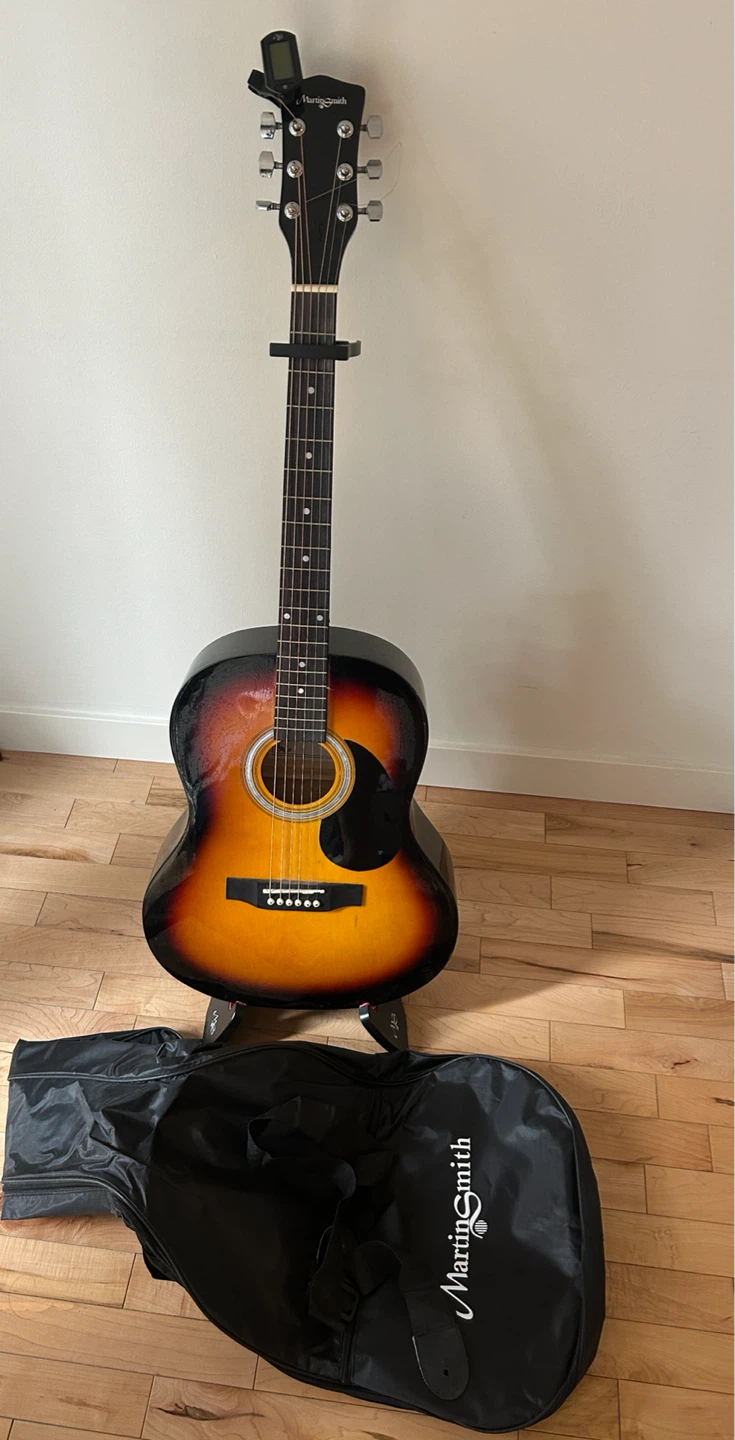 Martin Smith Acoustic Guitar with Gig Bag Capo, and Tuner