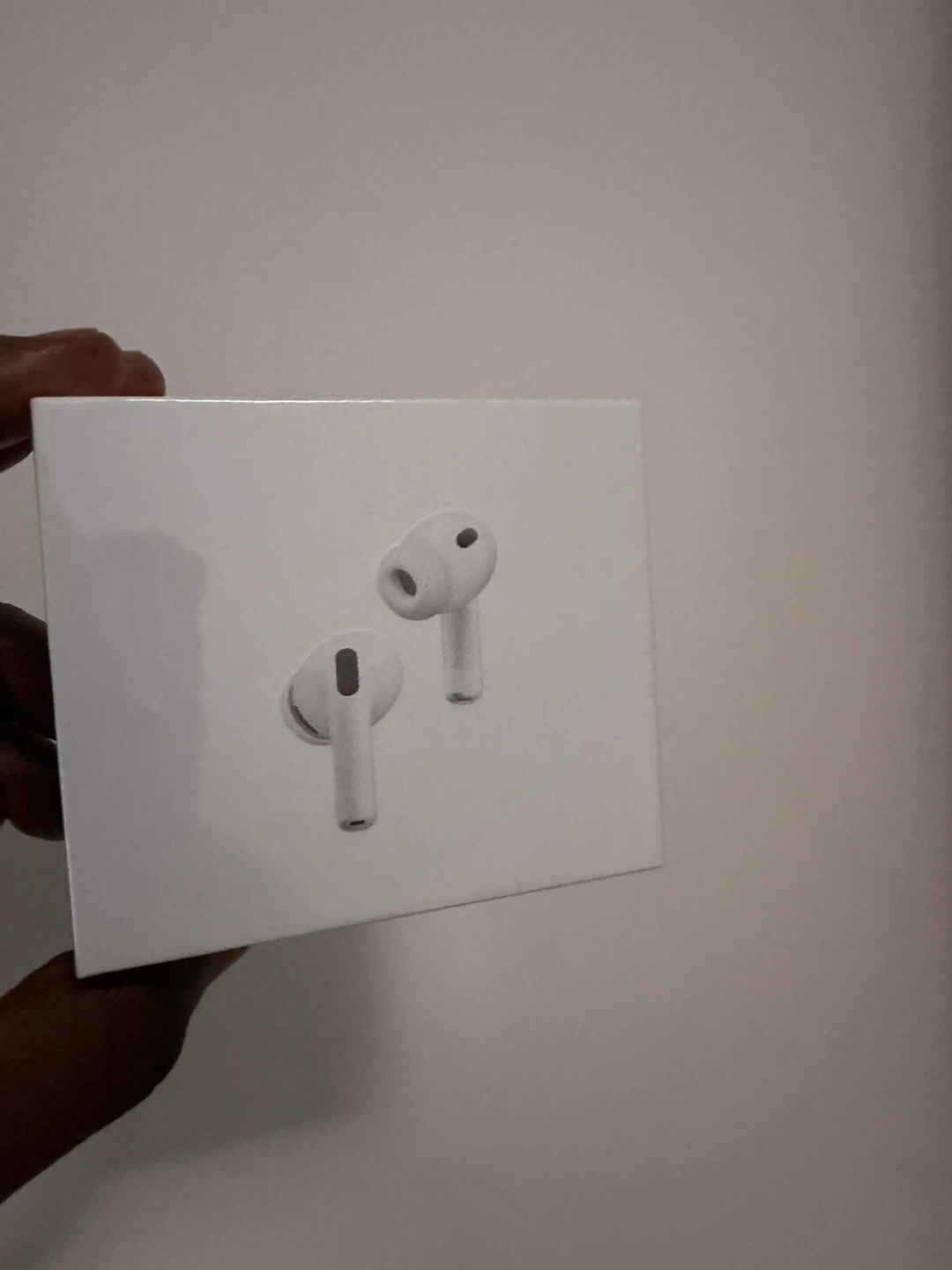 3 Apple AirPods one with nose cancellations