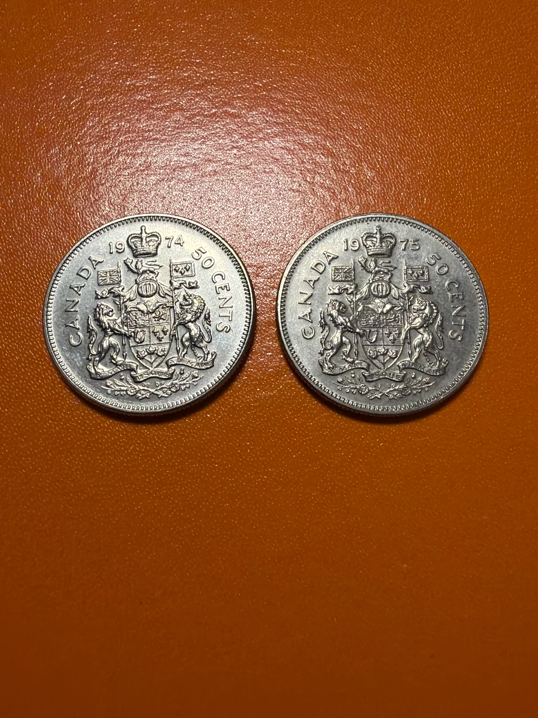 Two Canadian 50 Cent Coins - 1974 & 1975