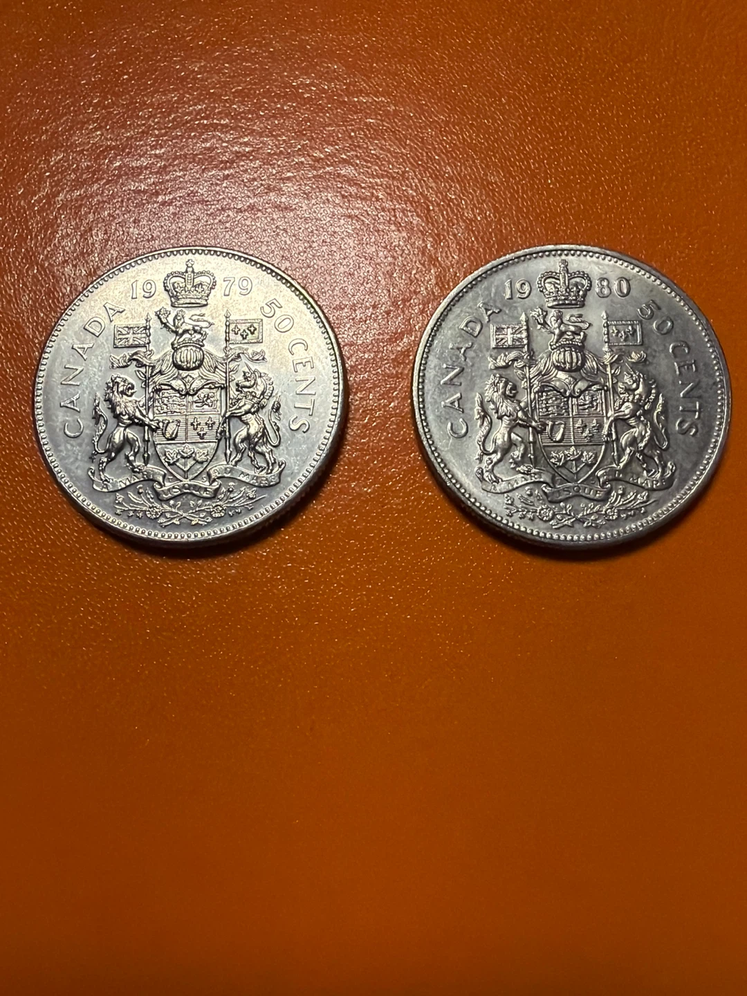 Two Canadian 50 Cent Coins - 1979 & 1980