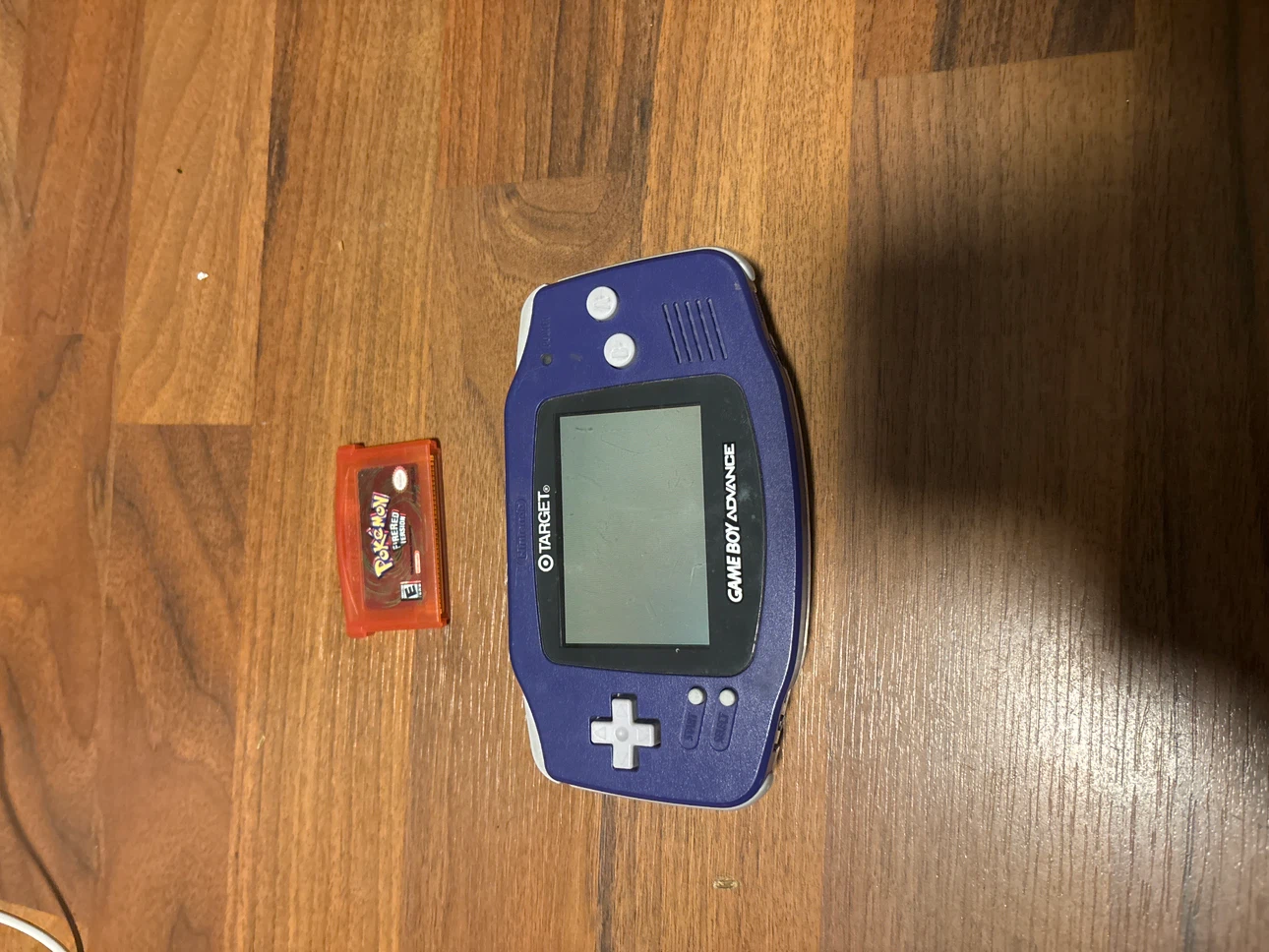 Gameboy advance with Pokémon red fire